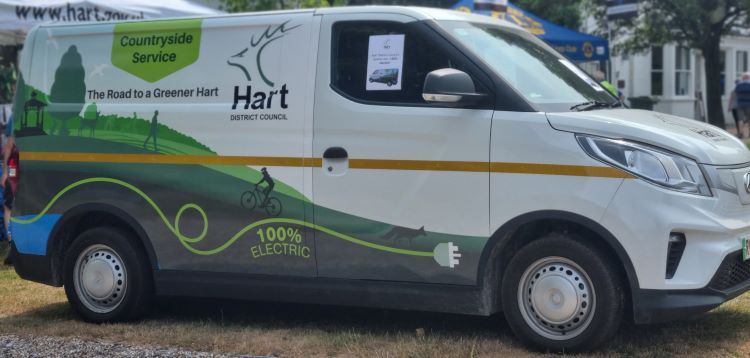 Countryside Service white electric van with Hart District logo and image of countryside on side of van
