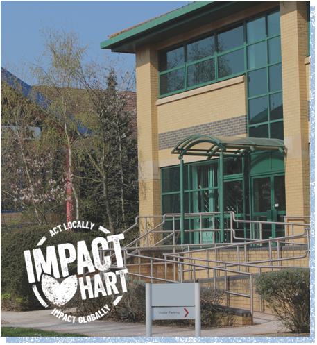 Offices, trees and Impact Hart logo
