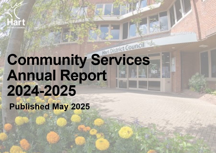 Red brick building office building with yellow and orange flowers in foreground with title Community Services Annual Report 2024-2025