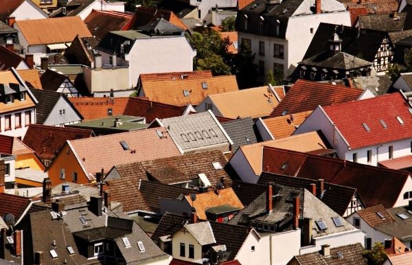 An aerial view of the roofs of houses