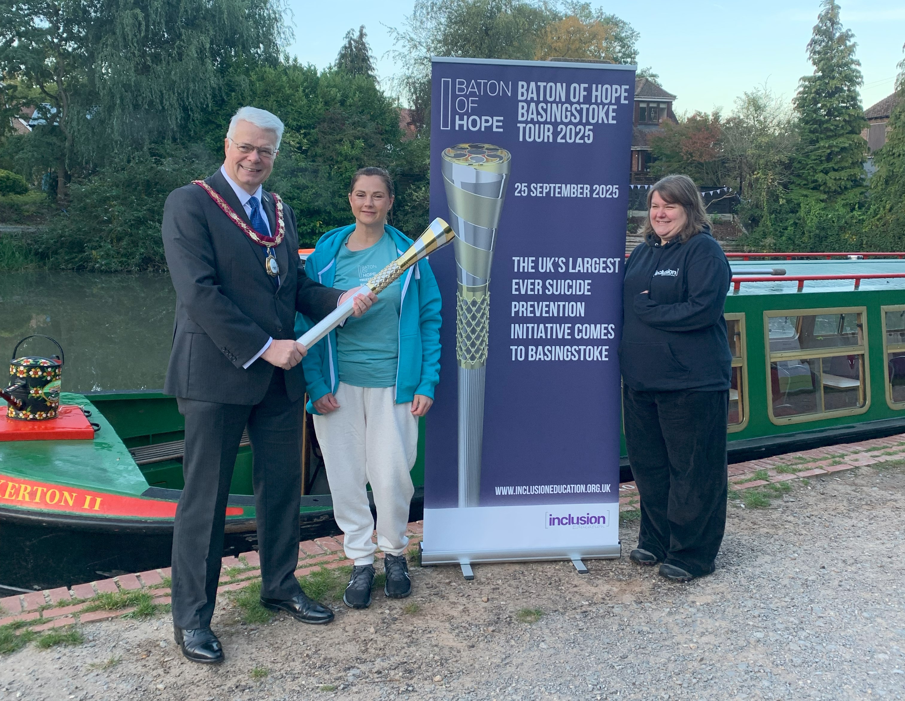 Chairman Councillor Chris Dorn with the Baton of Hope