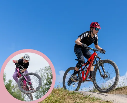 An image showing a female rider crossing a path, with a bubble zooming into another rider performing a jump