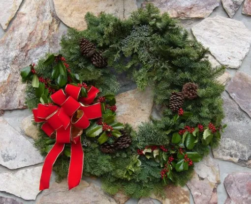 Green Christmas wreath with red bow