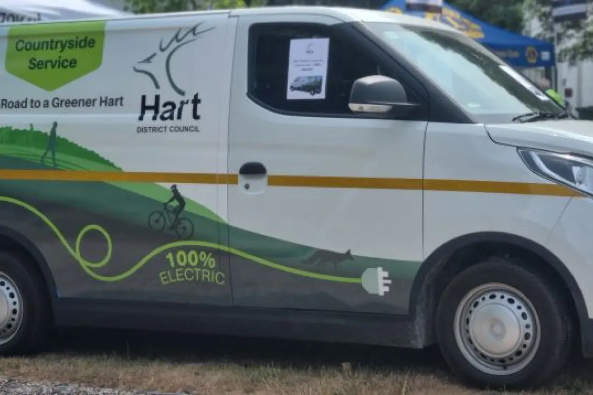Countryside Service white electric van with Hart District logo and image of countryside on side of van