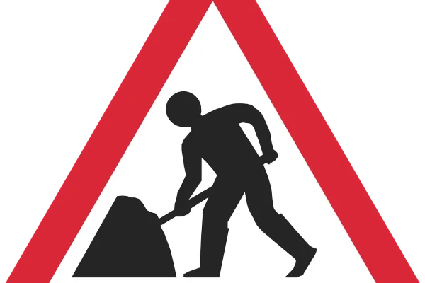 Outline of man digging a road