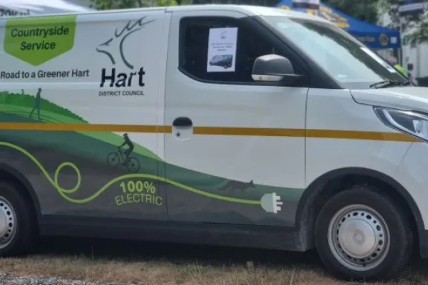 Countryside Service white electric van with Hart District logo and image of countryside on side of van