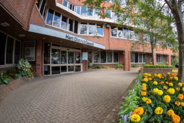 Hart District Council office entrance with orange and yellow flowers in foreground